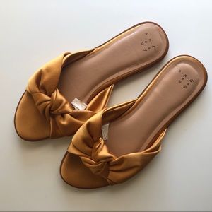 A New Day Yellow Gold Bow Slide Flat Slides